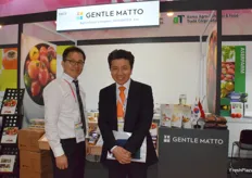 Mr Piao Renhao and his colleague are presenting the company at the booth.